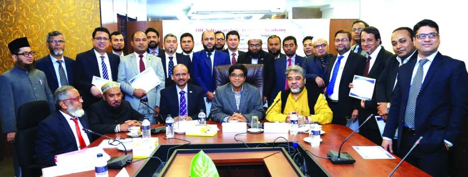 Arastoo Khan, Chairman of IBCF, poses with the participants of a two days long training programme on ''Sukuk: Shariah Framework, Structure, Issues, Opportunities and Challenges" organized by IBCF Research and Training Academy at BAB office in the city
