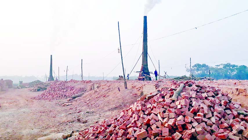 Influential encroachers running brick kiln business desperately in agricultural land without prior permission of the administration. But the authorities concerned turned a blind eye to remove the environmental hazards. This photo was taken from Laxmipur o