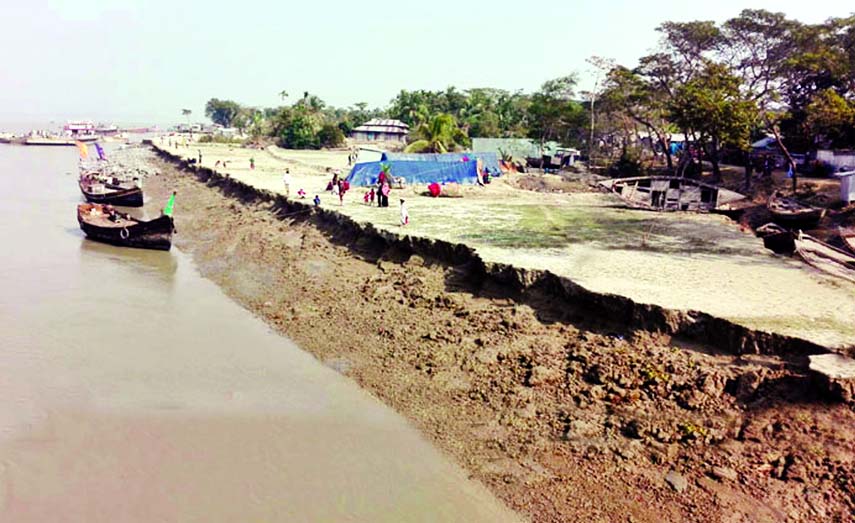 A major portion of Meghna River bank being eroded due to receding of waters. This photo was taken from Bhola Monpura Dwip on Friday.