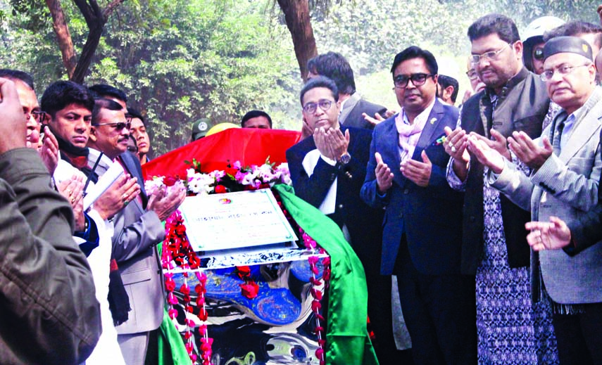 Mayor of Dhaka South City Corporation Mohammad Sayeed Khokon along with others offering munajat after laying foundation stone of development work at Osmani Udyan in the city on Saturday.