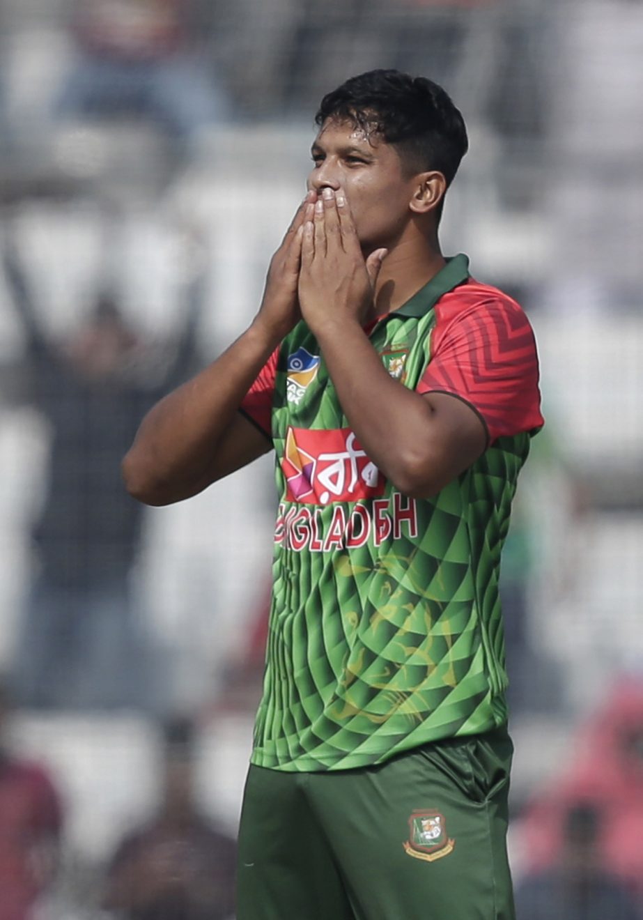 Mohammad Saifuddin celebrates the dismissal of Sri Lanka's Niroshan Dickwella during the final match of the Tri-Nation One-Day International cricket series at Sher-e-Bangla National Cricket Stadium at Mirpur on Saturday.