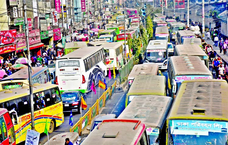 Hundreds of vehicles remained stuck at the huge traffic gridlock for several hours due to various socio-political programmes being held in front of Jatiya Press Club and at Paltan areas. This photo was taken on Saturday.