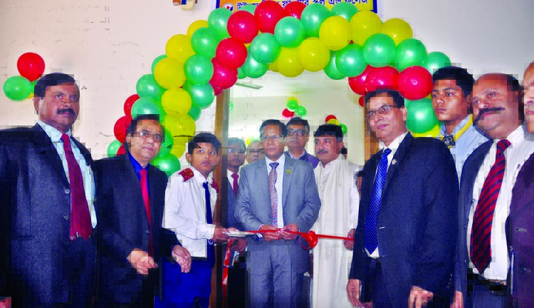 Commissioner of the Anti-Corruption Commission AFM Aminul Islam inaugurating Satata Store in the city's Willes Little Flower School & College on Sunday.