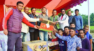 SYLHET: Tofayel Ahmed, founder and Chairman of Haji Tofayel Ahmed Trust distributing prizes of the final match of Mini Football Tournament organised by Young Fighter Sporting Club at Lalabazar Union recently.