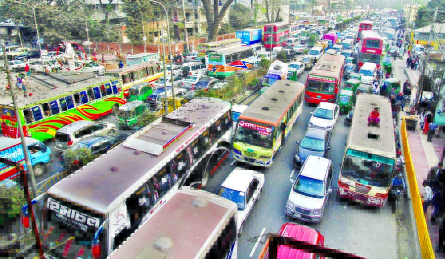 City experiences traffic congestion that continues to aggravate, causing serious sufferings to commuters and dwellers due to allowing people again to park their vehicles on busy road sides and wrong side driving. This photo was taken from Shahbagh area on