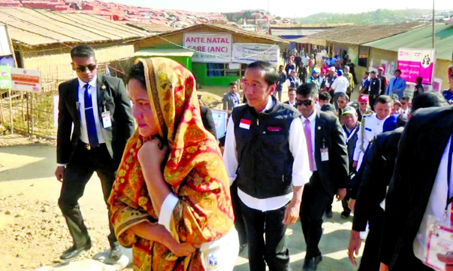 Indonesian President Joko Widodo visits a Rohingya refugee camp at Ukhiya, Cox's Bazar on Sunday.