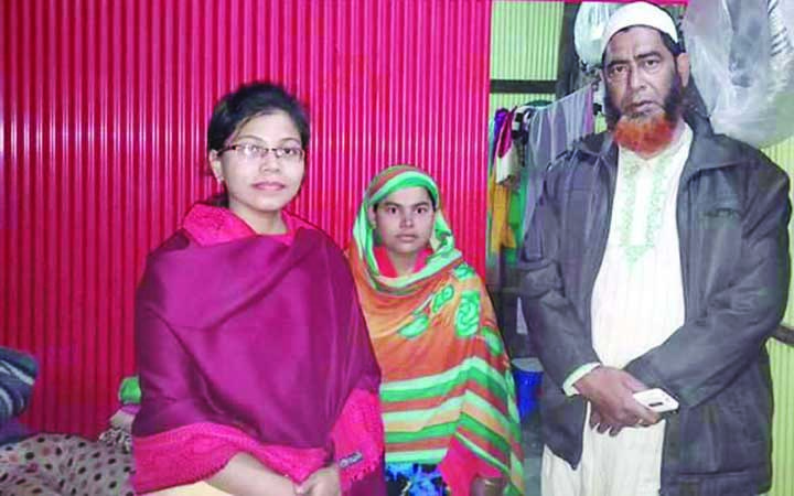 HAJIGANJ(Chandpur): Baishakhi Barua, UNO, Hajiganj and Abdul Hadi, Chairman, Rajargaon Upazila Parishad visiting allotted house of landless woman recently.