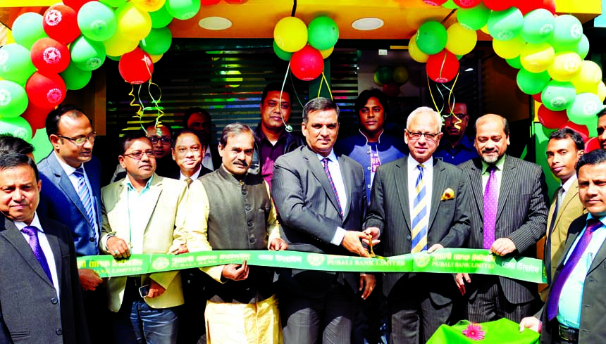 Md. Abdul Halim Chowdhury, Managing Director of Pubali Bank Limited, inaugurating its ATM Booth at Madan in Netrakona recently. Safiul Alam Khan Chowdhury, AMD, Mohammad Ali, DMD and Md. Rafiqul Islam, Mymensingh Regional Manager of the bank among others