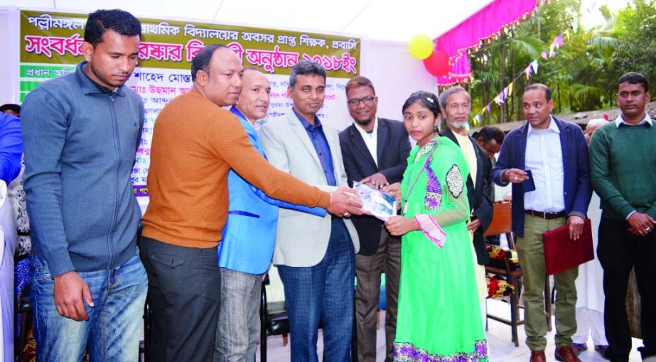 SYLHET: Shahad Mustafa, UNO, South Surma Upazila distributing prizes of annual sports competition and reception of retired teachers of Palli Mangal Government Primary School as Chief Guest recently.