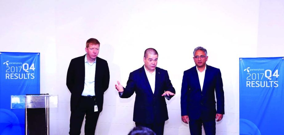 Grameenphone CEO Michael Patrick Foley (Center) speaking at the financial analyst of different brokerage houses along with Deputy CEO and CMO Yasir Azman and CFO Karl Erik Broten.