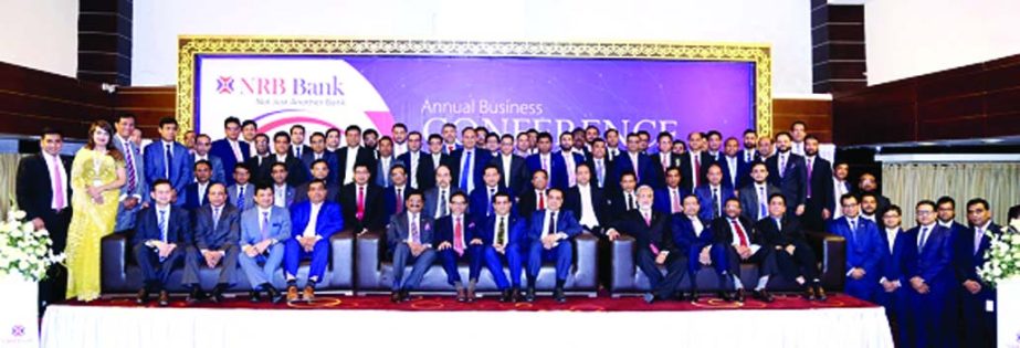 Mohammed Mahtabur Rahman, Chairman of NRB Bank Limited, poses with the participants of its 'Annual Business Conference-2018'at a hotel in the city on Saturday. Md. Mehmood Husain, Managing Director, Tateyama Kabir, Kamal Ahmed, Vice-Chairmen, M Badiuzza
