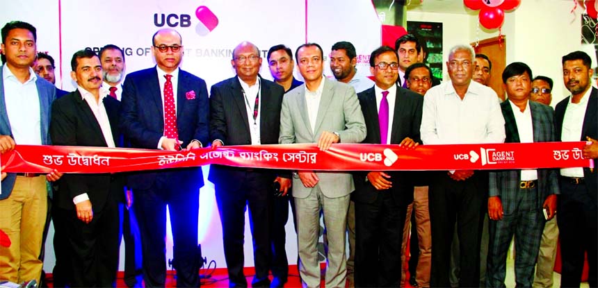 Anisuzzaman Chowdhury, EC Chairman of United Commercial Bank Limited (UCB) inaugurating its Agent Banking branch at Nawabgonj in the city on Thursday. A E Abdul Muhaimen, Managing Director and Ahsan Afzal, AMD of the bank among others were present.