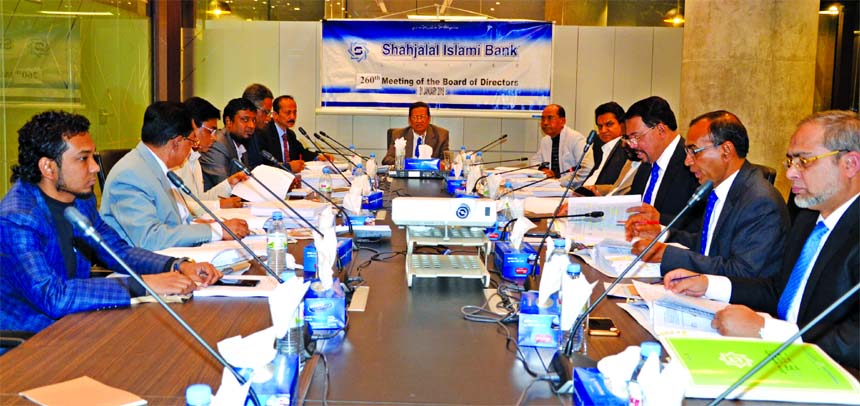 Akkas Uddin Mollah, Chairman of Shahjalal Islami Bank Limited, presiding over its 260th Board of Directors meeting at its head office on Wednesday. Farman R Chowdhury, Managing Director, Mohammed Golam Quddus, Khandaker Sakib Ahmed, Vice-Chairmen of the B