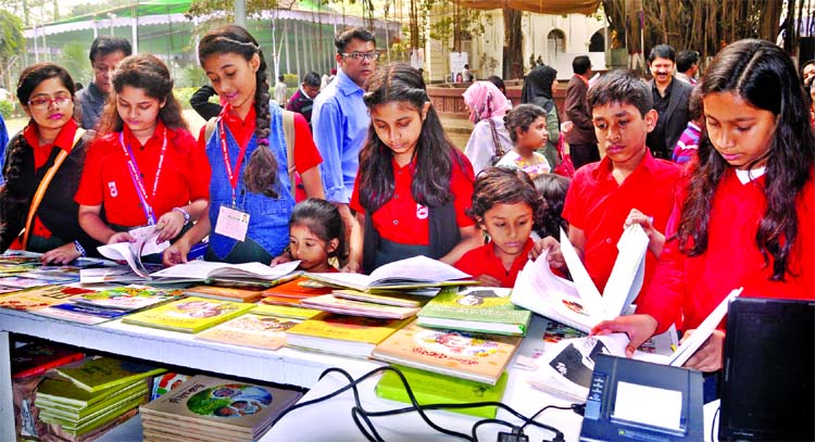Children thronged the 'Shishu Prahar' on the second day of Amar Ekushey Boi Mela on Bangla Academy premises on Friday.