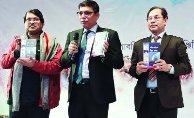 BAGERHAT: Md Rafiqul Islam, Chief Engineer , Public Works Department unwrapping the cover of the book titled 'Building Service and Fire Safety' by Kamal Pasha, Additional Chief Engineer, PWD at a ceremony at Gazipur on Friday.