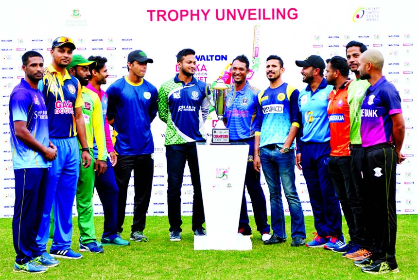 The captains of the participating teams of the Walton Dhaka Premier Division Cricket League pose with the trophy at the press conference room in the Sher-e-Bangla National Cricket Stadium, Mirpur on Sunday.