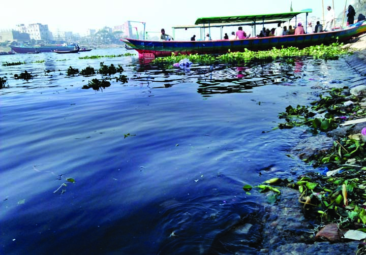Stinky and dirty waters flowing from different factories and city drains polluting the Buriganga waters, threatening diseases and environment. This photo was taken from near Sadarghat Launch Terminal on Monday.
