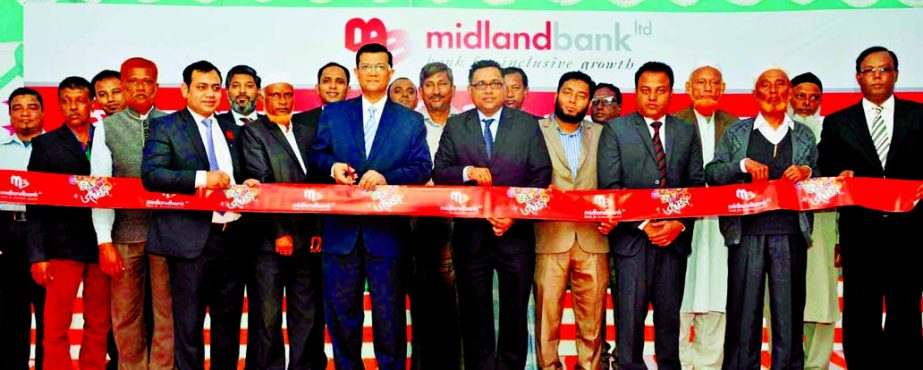Md. Ahsan-uz Zaman, Managing Director of Midland Bank Limited, inaugurating its Sompara Bazar Branch at Shahapur Union of Chatkhil Upazila in Noakhali recently. Md. Ridwanul Hoque, Head of Retail Distributions, Md. Emarat Hossain Khan, Head of GSD of the