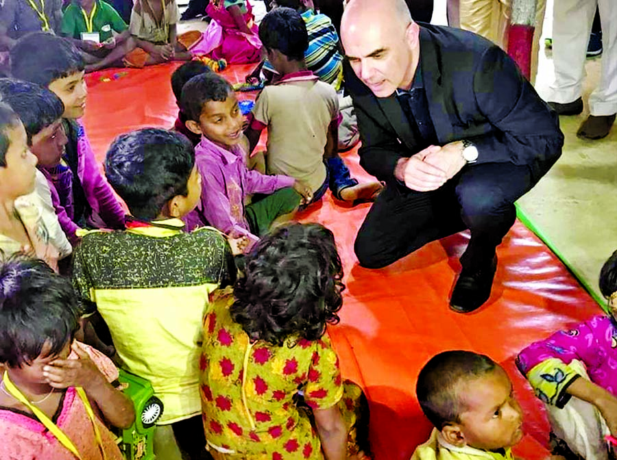 Swiss President Alaim Barset visited the Rohingya camp in Kutupalong in Cox's Bazar on Tuesday and was greeted by the child Rohingya refugees.