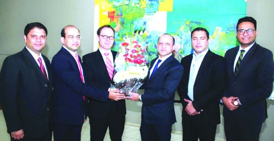 Ahmed Shaheen, DMD of Eastern Bank Limited and Dr. Hubertus Pleister, Director of Corporate Asia Loans of Germany's Development Finance Institution, celebrating their decade-long partnership in Dhaka recently. High officials from both the organizations w