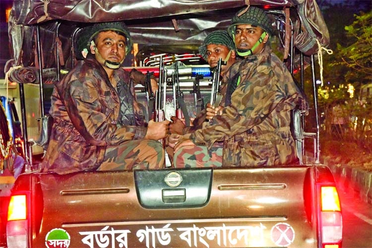 Members of Border Guard Bangladesh (BGB) patrolling city points to avert any untoward incident following the verdict against BNP Chairperson Begum Khaleda Zia's graft case today.