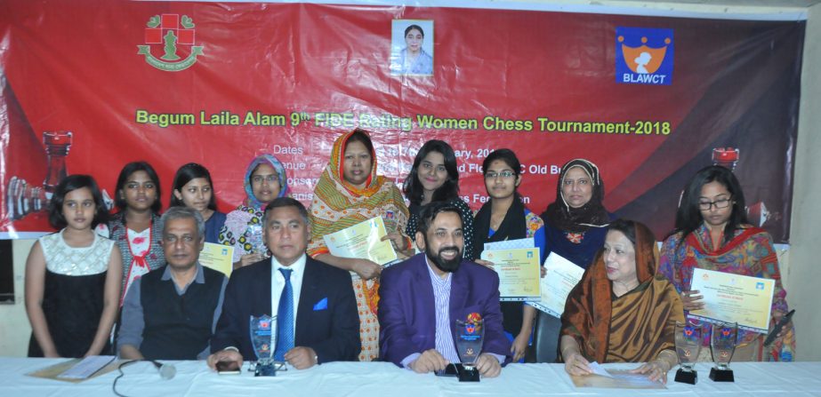 The winners of the Begum Laila Alam 9th Open FIDE Rating Chess Tournament with the guests and officials of Bangladesh Chess Federation pose for a photo session at Bangladesh Chess Federation hall-room on Wednesday.