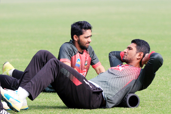 Mahmudullah and Mominul Hoque during practice session on Wednesday.