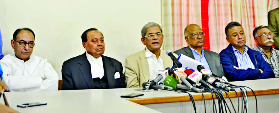 BNP Secretary General Mirza Fakhrul Islam Alamgir declaring programmes at the party central office in the city's Nayapalton on Thursday in protest against verdict on party Chairperson Begum Khaleda Zia.