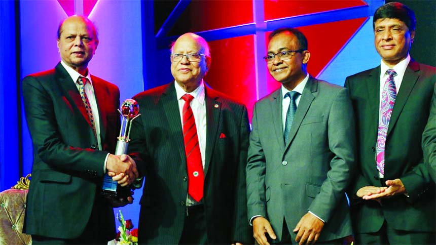 Md. Abdul Hamid Miah, Managing Director of Islami Bank Bangladesh Limited, receiving the 'ICMAB Best Corporate Award-2016' from Finance Minister Abul Maal Abdul Muhith, MP, as the best corporate banking sector in private commercial banks (Islamic Operat