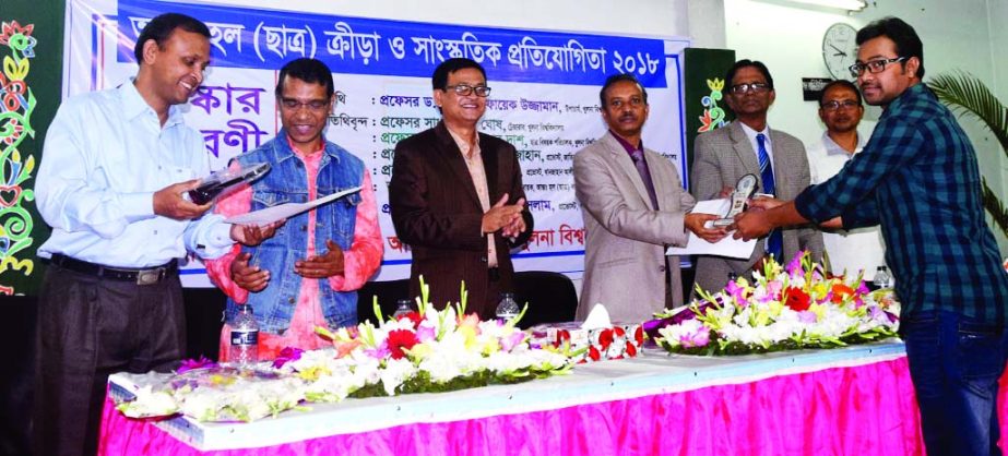 KHULNA UNIVERSITY: KU VC Prof Dr Mohammad Faiak Uzzaman distributing prizes among the winners as Chief Guest at the inter-hall sports and cultural competition on the campus on Tuesday.