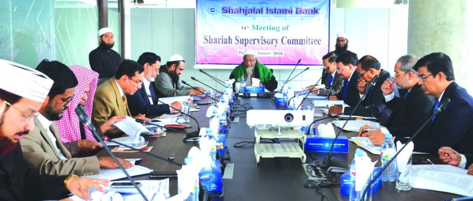 Mufti Abdul Halim Bukharee, Chairman, Shariah Supervisory Committee of of Shahjalal Islami Bank Limited, presiding over its 54th meeting at the bank's head office in the city recently. Akkas Uddin Mollah, Board of Directors Chairman, Farman R Chowdhury,
