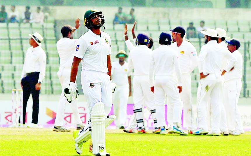 Mahmudullah Riyad of Bangladesh coming out from the field after he was dismissed by Akila Dananjaya of Sri Lanka on the second day of the second Test between Bangladesh and Sri Lanka at the Sher-e-Bangla National Cricket Stadium in the city's Mirpur on F