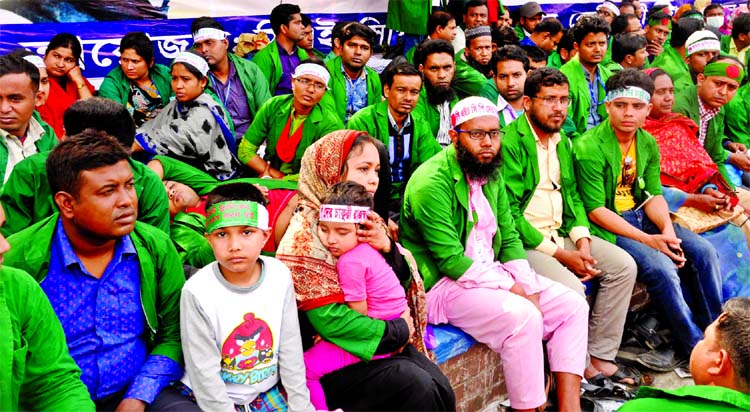 Community Health Service Providers (CHSP) continuing their hunger strike for eight days along with their kids, demanding for nationalisation of their services. This photo was taken from in front of Jatiya Press Club on Sunday.