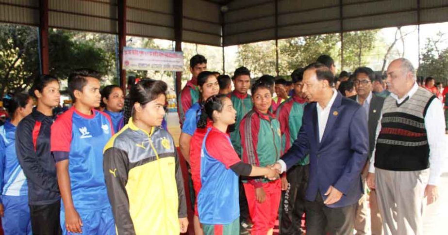 Secretary of the Youth and Sports of Bangladesh Awami League Harunur Rashid being introduced with the participants of the National Wrestling Competition at the Shaheed (Captain) M Mansur Ali National Handball Stadium on Sunday.