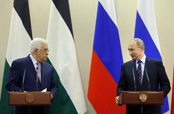 Palestinian leader Mahmud Abbas, pictured here with Vladimir Putin in May 2017, is seeking the Russian president's support following Washington's recognition of Jerusalem as Israel's capital. AP file photo
