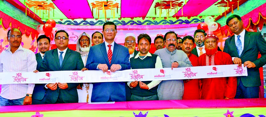 Md. Ahsan-uz Zaman, Managing Director of Midland Bank Limited, inaugurating an Agent Banking Centre at Moshipur Village in Shahjadpur in Sirajgonj recently. Senior officials of the bank, businessmen and local elites were also present.