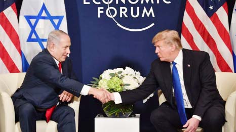 US President Donald Trump (R) speaks with Israel Prime Minister Benjamin Netanyahu in Davos, Switzerland