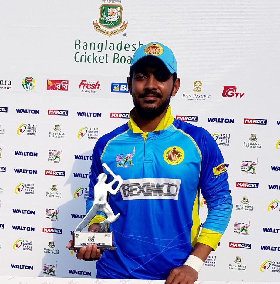 Saif Hasan of Dhaka Abahani Limited poses with the Man of the Match award at the Khan Shaheb Osman Ali Stadium in Fatullah on Tuesday.