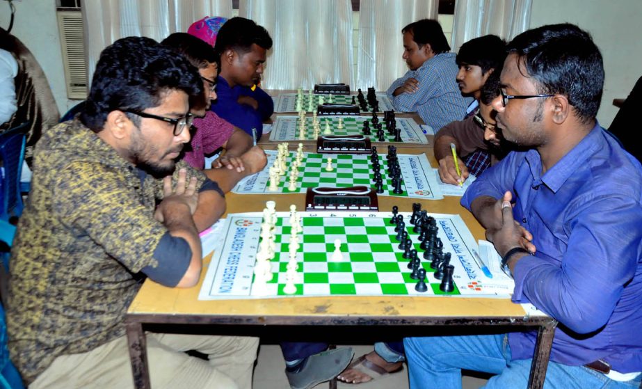A scene from the first round matches of the Esoft Arena FIDE Rating Chess Tournament at Bangladesh Chess Federation hall-room on Wednesday.