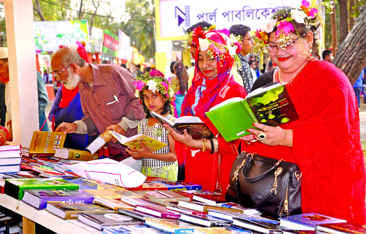 Book lovers crowded the Amar Ekushey Boi Mela at Bangla Academy premises marking the Valentine's Day on Wednesday.