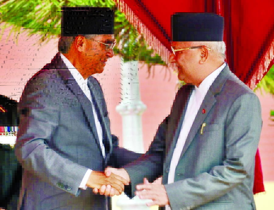 Communist party leader K.P. Oli (R) has been named prime minister following the resignation of Sher Bahadur Deuba (L). Internet photo