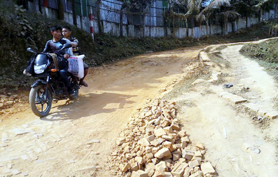 Dilapidated Amtoli Road at Halfchhari Union in Khagrachhari needs immediate repair. This snap was taken on Tuesday.