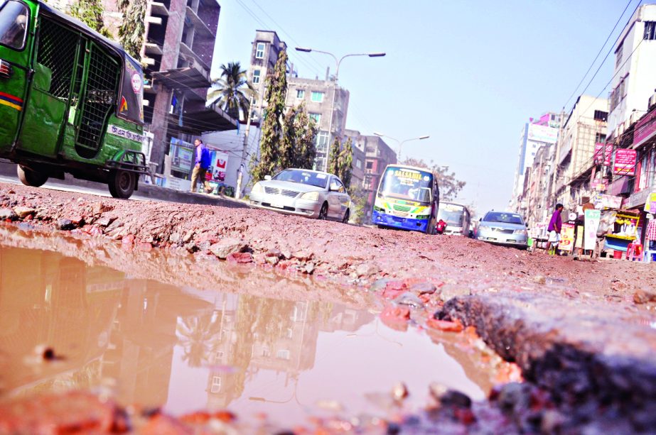 The main road of the city's Hazipara is in sorry state for the free movement of pedestrians and also passengers. The situation remains the same for long, but the authority concerned seemed to be blind to repair the road for the convenience of road users.