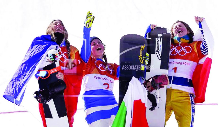 From left; Silver medal winner Julia Pereira de Sousa Mablieau of France, gold medal winner Michela Moioli of Italy and bronze medal winner Eva Samkova of the Czech Republic celebrate after the women's snowboard finals at Phoenix Snow Park at the 2018 Wi