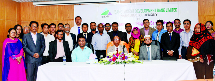 Manjur Ahmed, Managing Director of Bangladesh Development Bank Limited, poses with the participants of a 5 day-long workshop on "Nagorik Sebai Udvaban" at the bank Training Institute in the city on Tuesday. Senior officials of the bank were present.