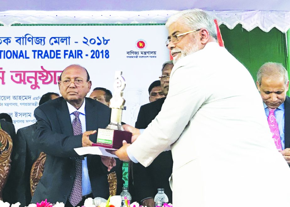 Kazi Rajib Uddin Ahmed Chapol, Chairman of Mousumi Industries Limited, receiving the 2nd prize of DITF-2018 under the General Pavilion Categories at the closing ceremony of Dhaka International Trade Fair in the city recently.