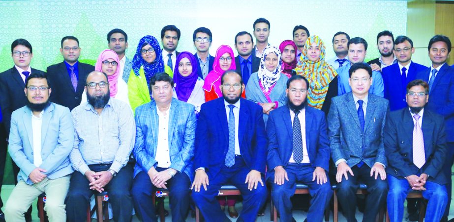 Md. Habibur Rahman, Managing Director of Al-Arafah Islami Bank Limited, poses with the participants of a training programme on 'Prevention of Money Laundering and Combating Financing of Terrorism' for its executive officer at its Training and Research I