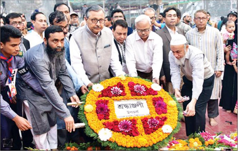 Prof Dr Saiful Islam, Vice-Chancellor of Bangladesh University of Engineering and Technology (BUET) paying tributes to the martyrs of the historic Language Movement with floral wreaths at the Central Shaheed Minar on Wednesday on the occasion of Amar Ekus