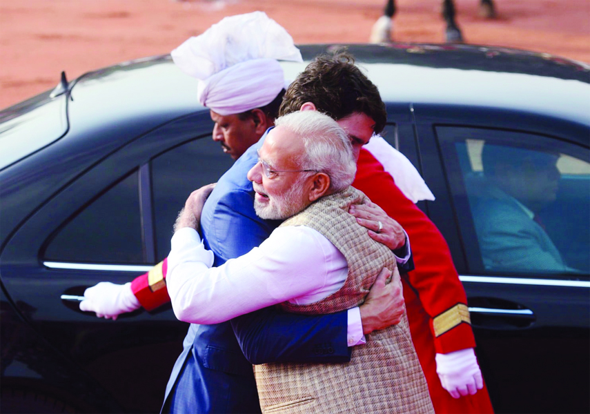 Canadian Prime Minister Justin Trudeau is greeted by Indian Prime Minister Narendra Modi as he arrives at the Presidential Palace in New Delhi, India on Friday.