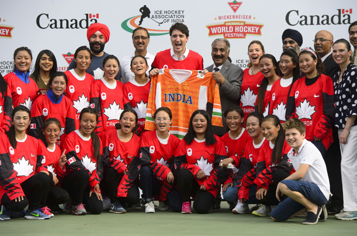 Canadian Prime Minister Justin Trudeau takes part in a hockey event with Hayley Wickenheiser (not pictured) and the Indian women's national ice hockey team at the Canadian High Commission of Canada in New Delhi, India on Saturday.